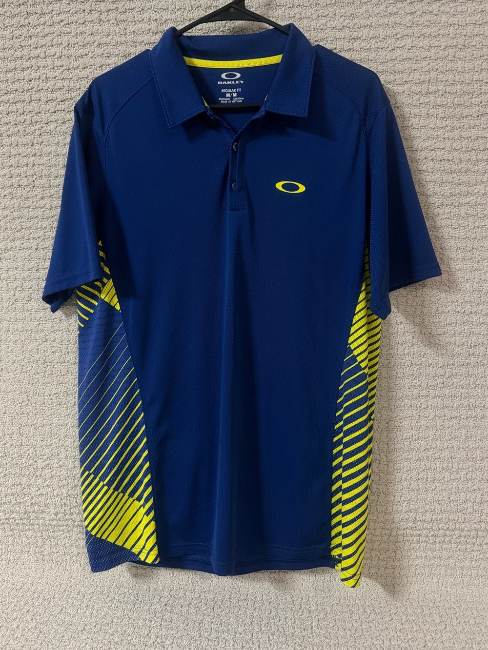 Oakley Men’s Blue golf Polo with Yellow Accents